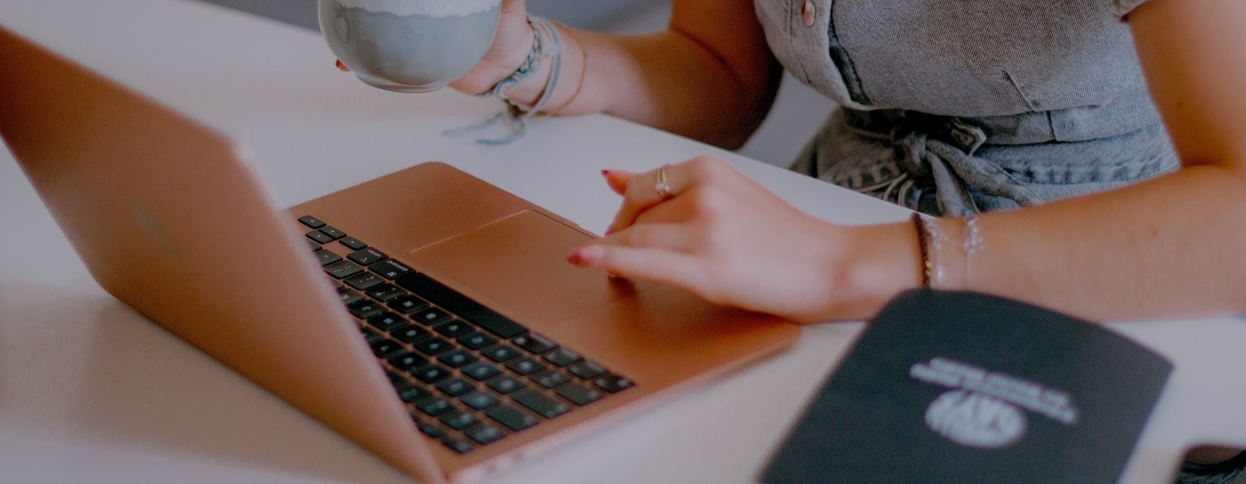 a woman typing on a computer